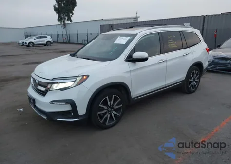 2021 Honda Pilot 2Wd Touring 8 Passenger z USA, uszkodzony, nr VIN 5FNYF5H90MB001707